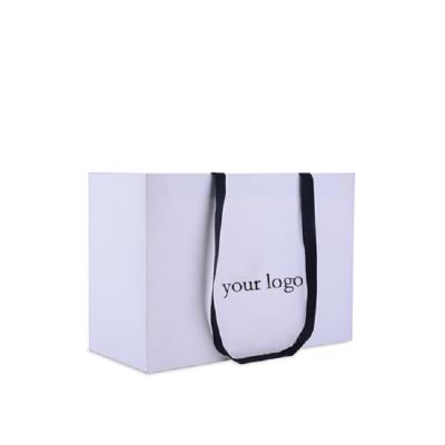 China Recyclable Promotion Foldable Shopping Gift Bags Logo Art Paper Bag With Handle Custom Made for sale