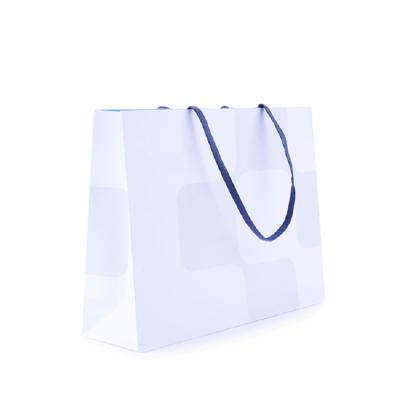 China Art Paper Bags New Gold Recyclable Luxury Foil Stamping White Shopping Bags With Your Logo Printed for sale