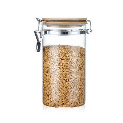 China Heatable Transparent Clear Sealed Airtight Glass Jar With Clamp Locking Bamboo Lid Lid Metal Lid for sale