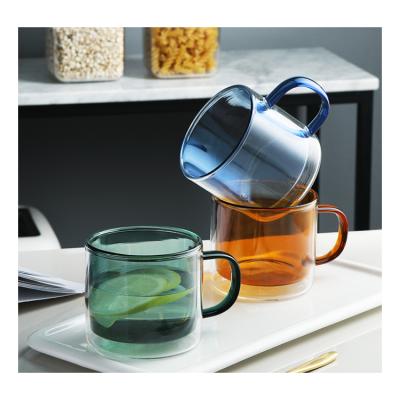 China Reusable blue colored borosilicate coffee cup double wall blue colored glass mug with handle for sale