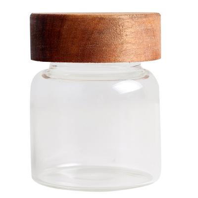 China Sustainable eco friendly borosilicate glass storage jars with acacia wood lid for sale for sale