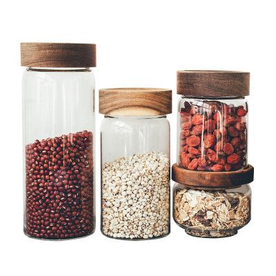 China Handmade Screw 335 580 800ml Borosilicate Glass Food Storage Jar Leak Proof Viable With Acacia Wood Lid for sale