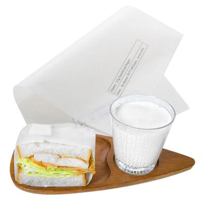 China 23g sulfite sandwich parchment paper 24cm*34cm for sale