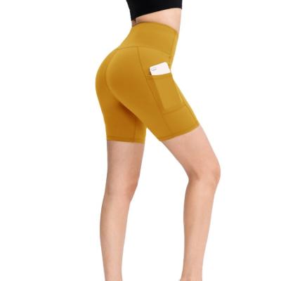 China Logo Printing Customized Breathable High Waisted Womens Seamless Yoga Pants Shorts With Pockets for sale