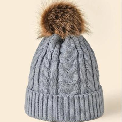 China COMMON Rope Beanie Faux Fur Pom Women Custom Cuffed Knitted Winter Hats Custom Beanie Hats for sale