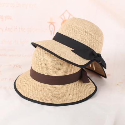 China Fashion Raffia Grass Straw Hat With Bow Outdoor Comfy Wear Summer Beach Hat For Women for sale