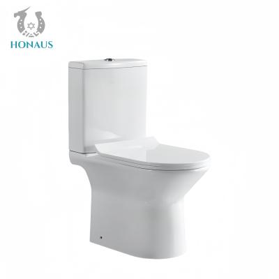 China Modern Two Piece Toilet Bowl Hotel Apartment Use Ceramic White Dual Flush Floor Drain for sale