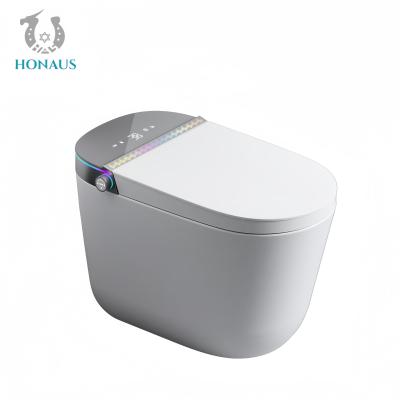 China Modern Smart Intelligent Toilet Best Ceramic Digital Screen Foam Shield Remote Control for sale