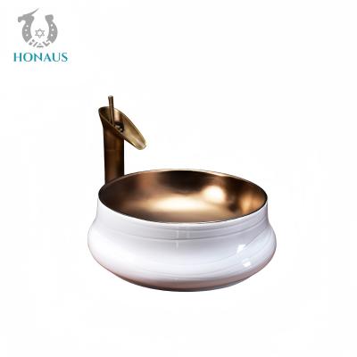 China Bathroom Countertop Basin Exquisite Ceramic Modern Style White Gold Coated Surface for sale