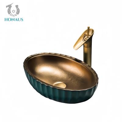 China Bathroom Countertop Basin Ceramic Made Art Design Electroplated Egg Shape for sale