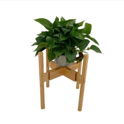 China Europe Pine Adjustable Modern Indoor Beech Plant Stand Bamboo Wooden Flower Pot Down Under Cart Wood Plant Plant Stands for sale