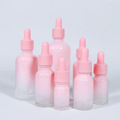 China 5ml 10ml 15ml 30ml Cosmetic Luxury Rose Gradient Bottle Dropper Serum Tour Essential Oil Glass Bottle With Dropper for sale