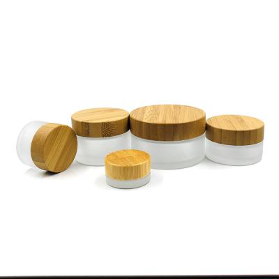 China 50g 15g 30g 50g 100g Luxury Frosted Cosmetics Packaging Containers Glass Cream Cosmetic Jar With Wooden Bamboo Lid for sale