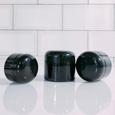 China Black Cosmetic Packaging Jar Skin Care Body Scrub Face Body Cream Glass Jar 20g 30g 50g With Black Plastic Lids for sale