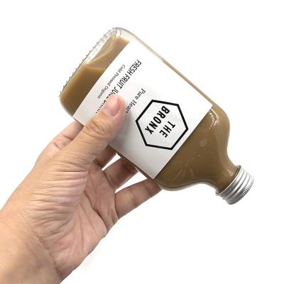 China 100ml 200ml Clear Flat Beverage Flask Liquor Milk Tea Whiskey Cold Brew Coffee Glass Bottle For Jucie Liquid for sale