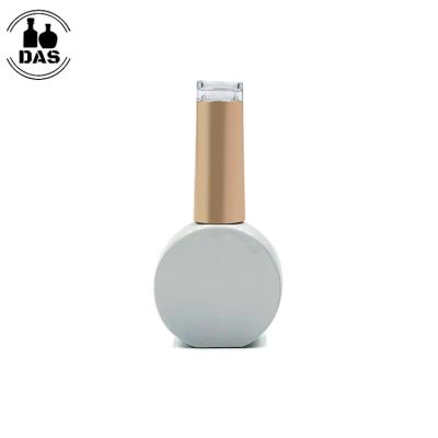 China Cosmetic Flat Round 12ml Empty White Nail Polish Bottle With Brush for sale