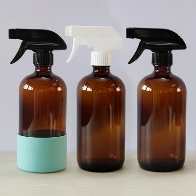 China HomeCare Sale 16oz Amber Silicone Sleeve Cleaning Hand Sanitizer Spray Glass Bottle With Black Trigger Sprayer for sale