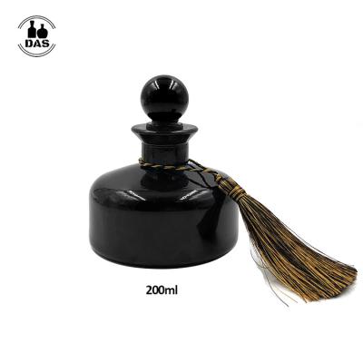 China 200ml Custom Luxury Empty Home Personal Care Room Round Black Perfume Reed Diffuser Glass Bottle With Lids For Diffuser for sale