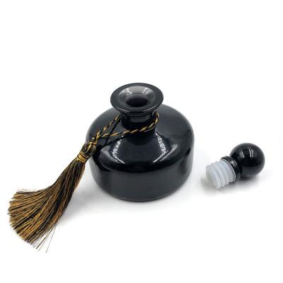 China Personal Care Supplier 200ml Black Room Perfume Empty Luxury Fancy Glass Diffuser Bottle With Cork Lids Black for sale