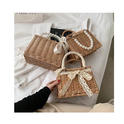 China Women Straw Bag Summer Beach Handwoven Fashion Beading Rattan Bucket Handbag Fashion Wicker Woven Shoulder Cross - Body Bag for sale