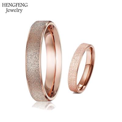 China Titanium 4mm Women's Titanium Rings Unique Rose Gold Wedding Band Ring Sandblast Bling for sale