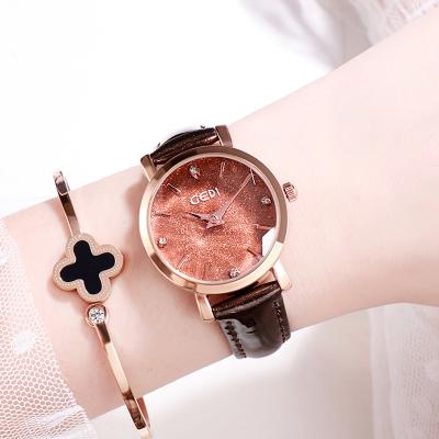 China Lady's Watch Elegant Diamond Bracelet 3ATM New Bling Water Resistant Quartz Luxury Women's Starry Wrist Watch for sale