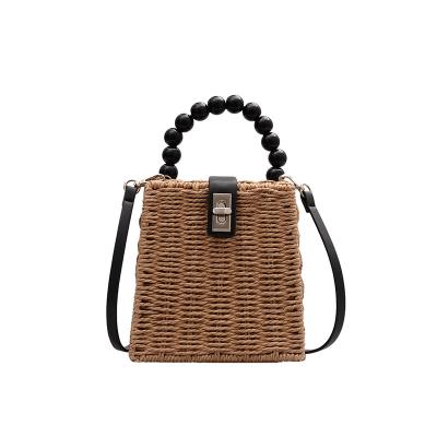 China Fasion Case Tote Straw Bag Handmade Women Rattan Small Woven Beach Handbag With Pearl Handle for sale