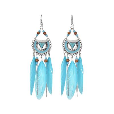 China BOHEMIA 2022 Popular Tassel Helix Shaped Earrings Long Rice Pearl Earrings Feather Earrings Women for sale