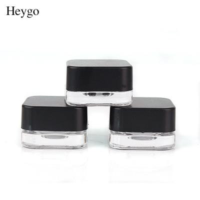 China HeyGo Eco-friendly Recyclable Low Profile 5ml Thick Bottom Clear Glass Jars With Black Lids Air Tight Container for sale