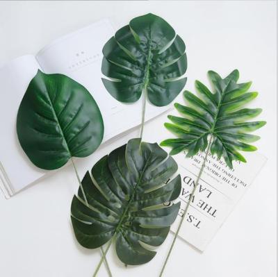 China Home Decoration Wall Plant Plastic Green Shooting Props Artificial Leaves for sale