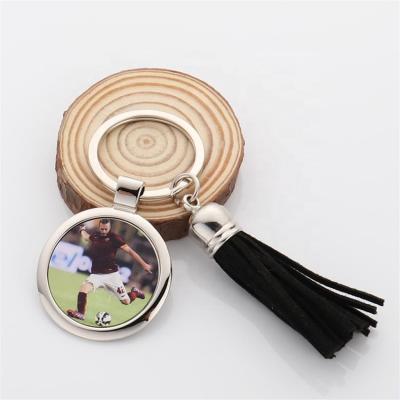 China Promotion Gift Round Single Sided Blank Tassel Metal Sublimation Keychains For Sport Promotion for sale