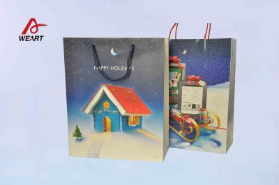 Chine Les sacs en papier de Noël d'art, cadeau unique de Noël met en sac la poignée bleue de coton à vendre