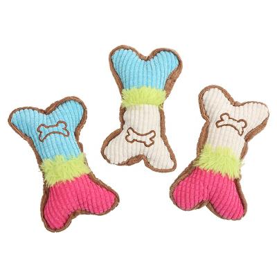 China Viable Dog Chewing Colorful Soft Plush Toys Stuffed Bones Chewing Teeth Molar Cleaning Squeaky Toy for sale