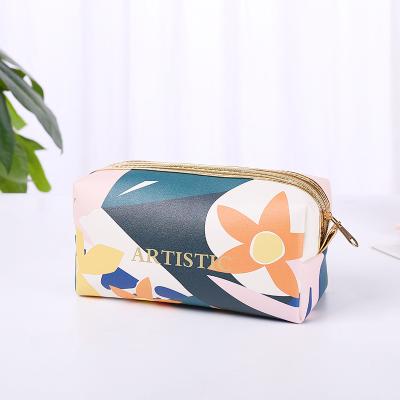 China 2021 New Arrival Convenient PU Leather Flowr Printing Portable Organizer Makeup Cosmetic Bag For Women Girls Te koop