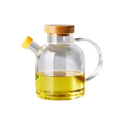 China 380ML Thickened Heat Resistant Glass Oil Pot , Lidded Heatproof Glass Oil Can for sale