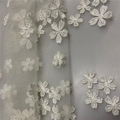 China New Breathable Design 3D Flower Embroidery White Tulle Lace Fabric Design For Dress for sale