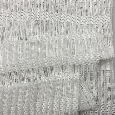 China Memory wholesale cheap polyester knitted white soft lace crochet embroidered net fabric for lady mesh dress for sale