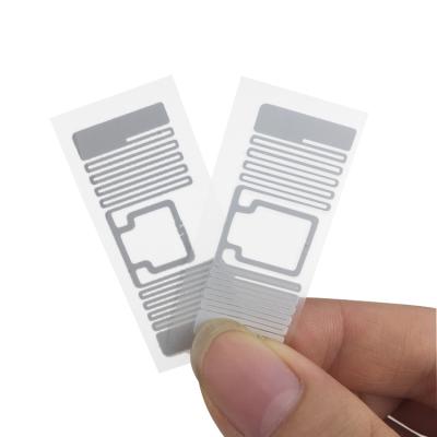 China Anti-counterfeiting UHF RFID Sticker For Library Book/CD Management Tag for sale