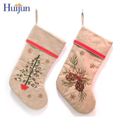 China Jute Christmas Stocking Embroidery Burlap Decorative Handmade Christmas Stocking for sale