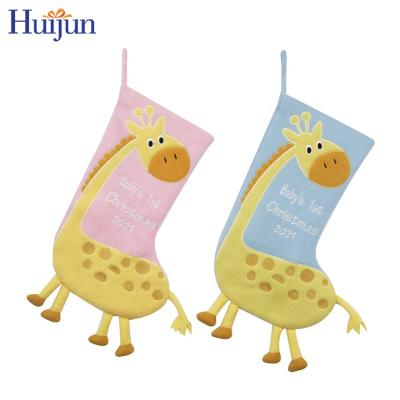 China Decorative Cute Giraffe 2021 3D Pink And Blue Soft Fleece Baby Stocking First Gift Christmas Gift for sale