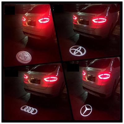 China Auto industry custom logo projector led auto car tail lamp warning light projection light for sale