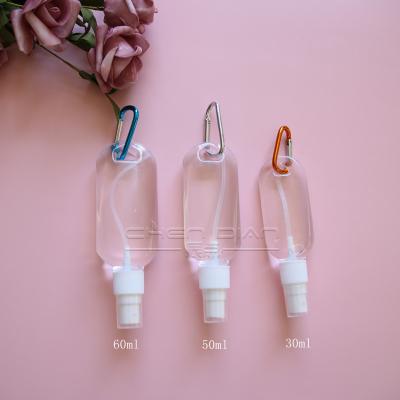 China Personal Care 30ml 50ml 60ml PETG Empty Clear Plastic Hand Wash Liquid Bottle Hand Care Key Chain Bottle Sprayer Bottle for sale