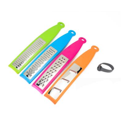 China 2021 Sustainable Amazon Success PP Kitchen Gadgets Stainless Steel Blade Handle Creative Four-in-One Combination Fruit Vegetable Grater for sale