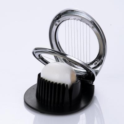 China Sustainable Multifunctional Plastic Egg Cutter Kitchen Tools 2 In 1 Vegetable Slicer for sale