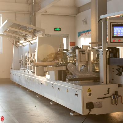 Κίνα High Speed Wood Edge Banding Machine Cabinet Making PVC Automatic Edge Trimming Machine προς πώληση