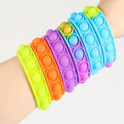 China Anti stress Amazon hot selling silicone wristbands jump fidgeting wristbands relaxation wristband wristband charms toys for sale