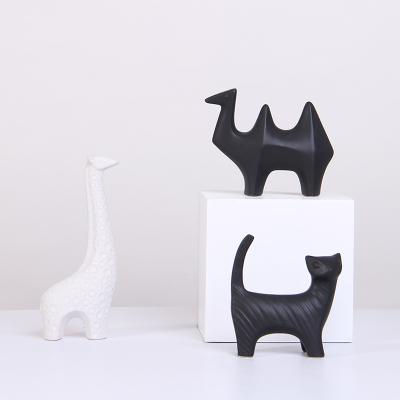 China Europe Porcelain Custom Wholesale Handmade Ceramic Crafts Small Figurines Black And White Animal Statue For Kids Room Decoration for sale