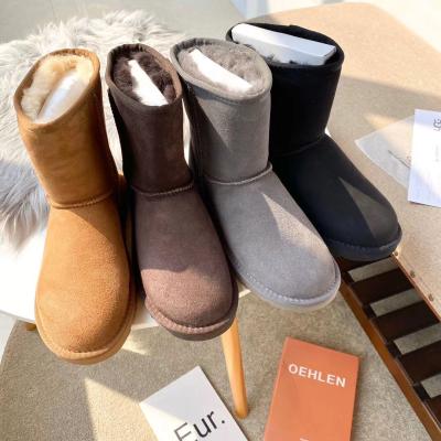 China Fashion trend winter where wholesale fashion trend rejects snow sheepskin fur rejects warm women snow boots for sale