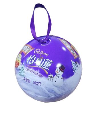 China Promotional Cake Ball Shape Christmas Candy Tins With Ribbon for sale