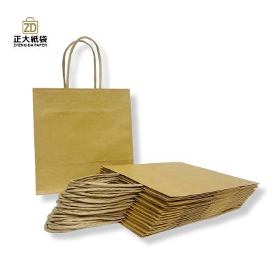 China Eco - Friendly Brown Kraft Paper Bags Clothes Packaging Bags for sale